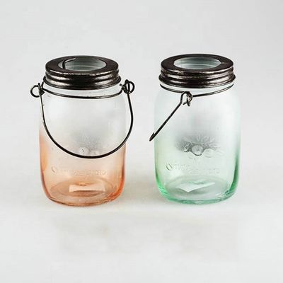 スタイリッシュで透明なガラス収納器 彩色のプラスチックカバー 100%食品安全
