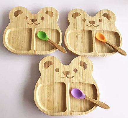 木製 の 吸い込み プレート は,赤ん坊 や 幼児 に 固体 食品 を 導入 する 完璧な 方法 です